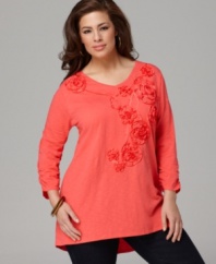 Floral applique lends a romantic feel to Style&co.'s three-quarter sleeve plus size top, punctuated by a high-low hem.