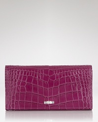 Croc-embossed leather lends chic texture to this bifold continental wallet from Longchamp.