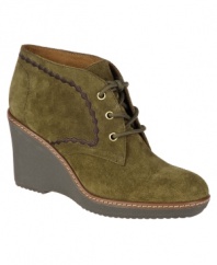 Casual chic defines Naturalizer's Kaitlyn ankle boots. Crafted in suede with a lace-up closure on the vamp, they feature a trendy wedge silhouette. They're completely comfortable as well, thanks to a round-toe shape and wearable heel.