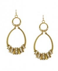 Every girl loves a little glamour. Jessica Simpson's elegant oval-shaped drop earrings light up an evening affair with stylish spacers embellished by round-cut crystals. Crafted in gold tone mixed metal. Approximate drop: 3 inches.