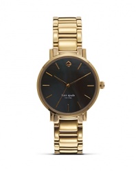 Take an citified approach to accessorizing with this gold-plated watch from kate spade new york. It's round design is city chic, while the Mother-of-Pearl face is oh so urbane.