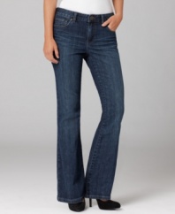 Subtle whiskering at the hips gives these petite Calvin Klein jeans a lived-in feel. Embroidered back pockets and a stylish flare finish the look.