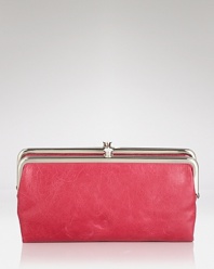 Sleek and shiny, this Hobo leather wallet is a chic home for your cash.