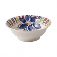 Adorned with a plush blue flower framed by a rim of multihued classic floral patterns, the Eden cereal bowl brings a fresh, fun energy to the table.