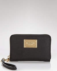 MICHAEL Michael Kors gives the on-the-go girl exactly what she needs (and wants): a stylish and sleek spot to stow her PDA.