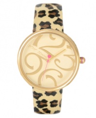 Go on the prowl with this exotic creation from Betsey Johnson. Watch crafted of leopard print leather strap and oversized round gold tone mixed metal case. Champagne dial features large gold-tone numerals, hour and minute hands, signature fuchsia second hand and logo. Quartz movement. Water resistant to 30 meters. Two-year limited warranty.
