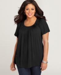A pleated neckline lends an elegant feel to this ultra-flattering short sleeve plus size top by Style&co.