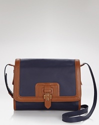 Nail this season's mini bag trend with this coated canvas crossbody from Tory Burch. In a primary palette with polished trims, it's a small scale statement piece.