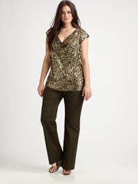 Shimmer and shine this season in this sequined-front design with a jersey back. The draped neckline is feminine and the cap sleeves provide flattering arm coverage.Draped necklineCap sleevesSequined frontPull-on styleAbout 27 from shoulder to hemRayonHand washImported