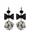 Bring a little Studio 54 flavor to the table with chic disco ball-inspired earrings.  Flashy crystal fireballs dangle from bold, black ribbon and flower drops. Betsey Johnson earrings crafted in antique gold tone mixed metal. Approximate drop: 1-1/2 inches.