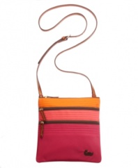 This season is all about the colorblock, and this versatile design by Dooney & Bourke executes it perfectly. Two exterior pockets provide easy access to necessities while a tri-tone exterior keeps you right on trend.