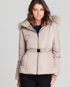 Touting a lush fur-trimmed hood and plush down filling, this Bloomingdale's Exclusive Gerard Darel coat lends sumptuous style to the season.