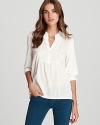 It's all in the refined details with this versatile Soft Joie top, featuring a button placket and intricate pintucking.
