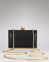 La Regale's shimmering mesh clutch is the perfect finish to your evening look.