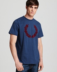 Emblazoned with a large graphic of Fred Perry's signature logo, this soft tee gives you a reliable option to pair with shorts or jeans.