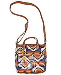 Boho-chic vintage prints and glossy coated canvas make this crossbody purse a natural choice for brunch and shopping with the girls.