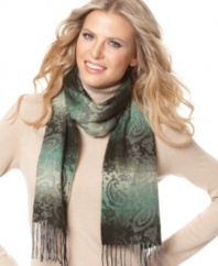Add a splash of sophistication with the rich ombre color of the paisley on this brushed knit scarf by Cejon.