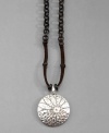 Carefree style that makes you feel right at home. This trendy Lucky Brand necklace features a brown suede cord, an antiqued mixed metal chain and a pretty hammered silver daisy pendant. Approximate length: 23 inches + 12-1/2 inch extender. Approximate drop: 1 inch.