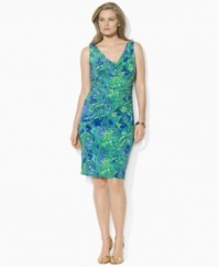 Flowing matte jersey accented with a vibrant, deep blue paisley print forms the flattering silhouette of Lauren by Ralph Lauren's sleeveless plus size dress, finished with a cowl neckline for chic, flawless elegance.