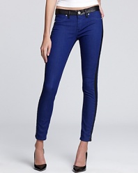 These boldly hued BLANKNYC skinny jeans boast a faux leather waistband and tuxedo stripes for added edge.