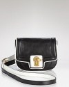 Juicy Couture makes chic work of this season's mini bag trend with this leather crossbody, accented by classic gold-tone hardware. Ideally sized for ease-at-night or days on-the-go, it's a small-scale statement piece.