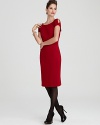Shoulder cutouts and a striking red hue lend traffic-stopping style to this alluring Tahari ASL dress. Layer beneath an iconic blazer at the office or on its own for cocktail hour.