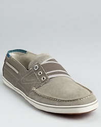 Tretorn's sporty take on the classic boat shoe adds a lower profile and a striped elastic band across the tongue.