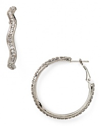 Delicately adorned with crystal stones, this pair of shapely hoop earrings from Aqua is a modern take on an ever-chic style. Slip them in as a modern touch.