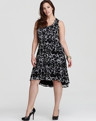 Enlivened by a graphic cheetah print, this Karen Kane Plus dress ensures spot-on summer style. Tame the look with sleek, black accents for a restrained walk on the wild side.