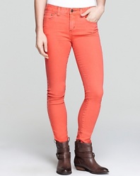 Color outside the lines in these Free People high-rise skinny jeans--a vibrant addition to your denim repertoire.
