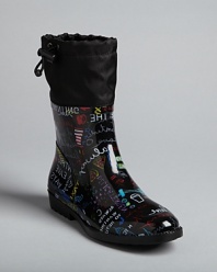 Add some colorful whimsy when gray skies loom in these fun and functional DKNY rain boots, with an eye-catching graffiti print.