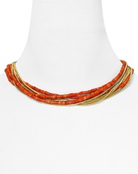 Let MICHAEL Michael Kors lend every look a colorful touch with this beaded coral and gold tone bib necklace. It's bold layered look instantly enlivens your neckline.