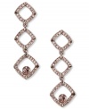 Triple play. These drop earrings from Givenchy sparkle with vintage rose stones and a triple drop silhouette. Crafted in brown gold tone mixed metal. Approximate drop: 2-1/8 inches.