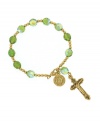 Get faith-inspired style with rosary-themed jewelry by Vatican. Bracelet features a gold tone mixed metal chain, charm, and cross accented by plastic olivine beads. Approximate length: 6-1/2 inches. Approximate charm drop: 1-3/4 inches.