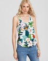 Pretty as a postcard, this Juicy Couture tank flaunts a vibrant tropical print for an enchanting summer escape.