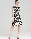 Go bold in black and white with this kate spade new york dress, touting an oversized, graphic print for a strong feminine statement. Polish off the look with sleek pumps and a slash of lipstick.