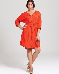 A vibrant orange hue loosens up the classic T Bags Plus shirt dress for a refreshing approach to workweek chic. Shake up the monochromatic silhouette with acid-bright accents.