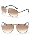 These aviator sunglasses are timelessly chic and feature the iconic Gucci logo on the temple.