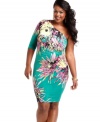 A blast of blossoms sparks up Baby Phat's one-shoulder plus size dress, defined by a curve-hugging fit.
