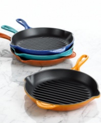 Great grilled flavor goes indoors with Le Creuset's versatile skillet grill, made with a ribbed base that adds traditional char lines to food and whisks fat and grease right away from food. The enameled cast iron construction produces extraordinary results on any kind of cooktop, getting hot fast and retaining heat efficiently. Limited lifetime warranty.