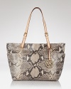 Give your look a luxe, exotic finish with this python-embossed leather tote from the master of chic: MICHAEL Michael Kors.