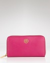 Loved for it's polished look, Tory Burch's zip around wallet is an ever-chic essential. With eight credit card pockets and an interior zip pocket, this latest piece from the NYC label offers the substance to match the style.