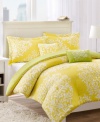 Perfect harmony. A bright yellow hue and exotic floral design become the focal point of your room in this Harmony comforter set for an inspired new look. Reverses to solid green.