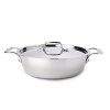 Named after a hearty one-pot casserole dish enjoyed at the finest French bistros, this rounded pot is shaped ideally to recreate the original French recipe at home, or a favorite family casserole. In addition to its versatile use preparing delicious stove top and oven comfort foods, its loop handles make it easy to carry straight from the kitchen to the table.