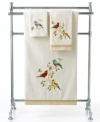 A touch of Spring. Featuring intricately embroidered birds on pure cotton, Avanti's Gilded Birds hand towel accents your space with an air of elegance perfect in any season. Sheared velour face; terry reverse. Finished with two-tone ribbon trim.