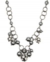 Luxe links. AK Anne Klein's chain link necklace makes a striking statement. With lustrous acrylic pearls in a gorgeous shade of gray as well as glittering glass accents, it's crafted in hematite tone mixed metal. Approximate length: 16 inches.