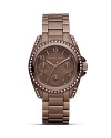 Work this season's espresso-toned watch trend with this sporty style from MICHAEL Michael Kors. Boasting a dusting of crystals, it's a subtle way to work sparkle.
