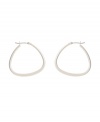 Traditional hoops with an up-to-date twist. Kenneth Cole New York earrings feature a modern pear-shaped hoop in silver tone mixed metal. Approximate diameter: 1 inch.