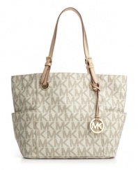 Make a signature statement this season with Michael Kors' chic logo print tote.