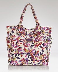 MARC BY MARC JACOBS is in full bloom with this nylon tote. A familiar shape updated in a bold print, it's an effortless essential for work or play.
